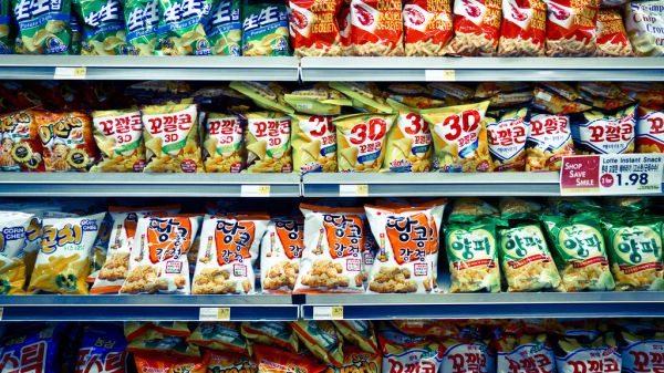 Shelves of Korean snacks in a grocery store