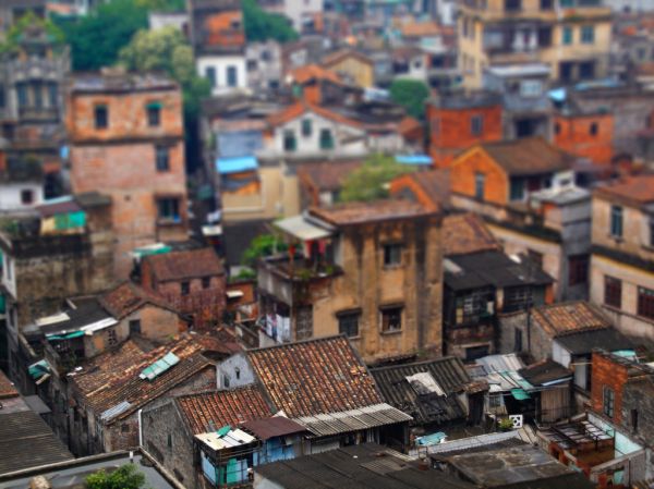 View of residential rooftops with solar panels