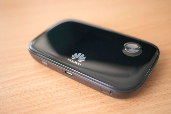 Portable pocket WiFi router on a table