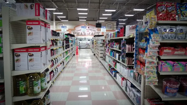 Interior of a convenience store with snack aisles