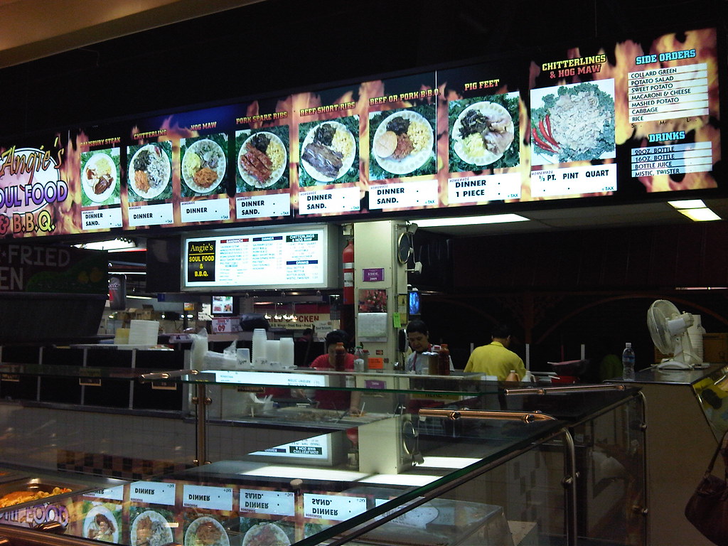 Vendor selling prepared side dishes at a Korean market