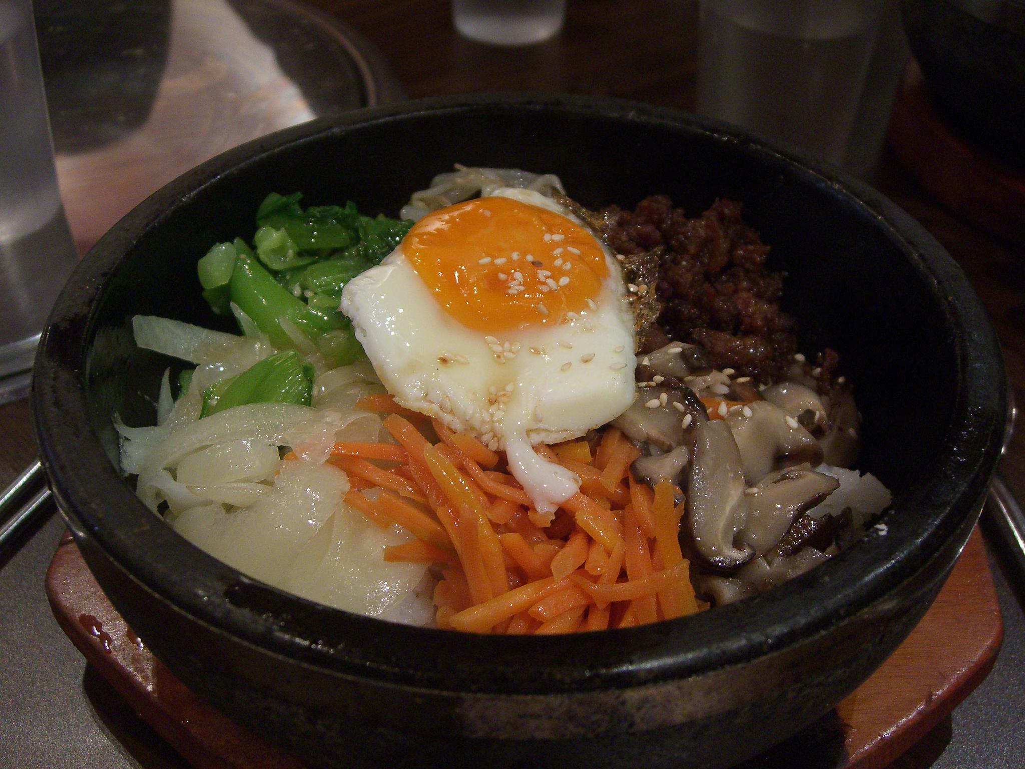 Small plates of Korean banchan arranged on a table